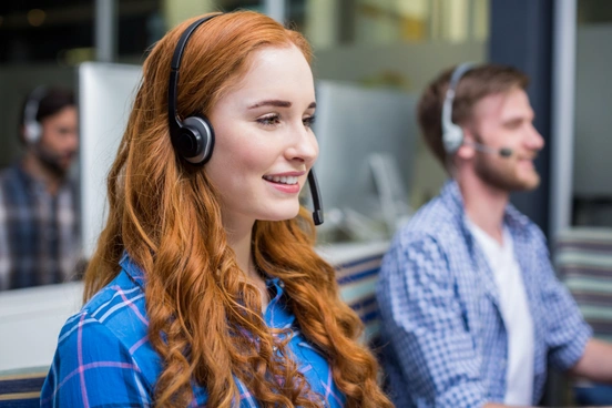 Smiling customer service representative during a conversation
